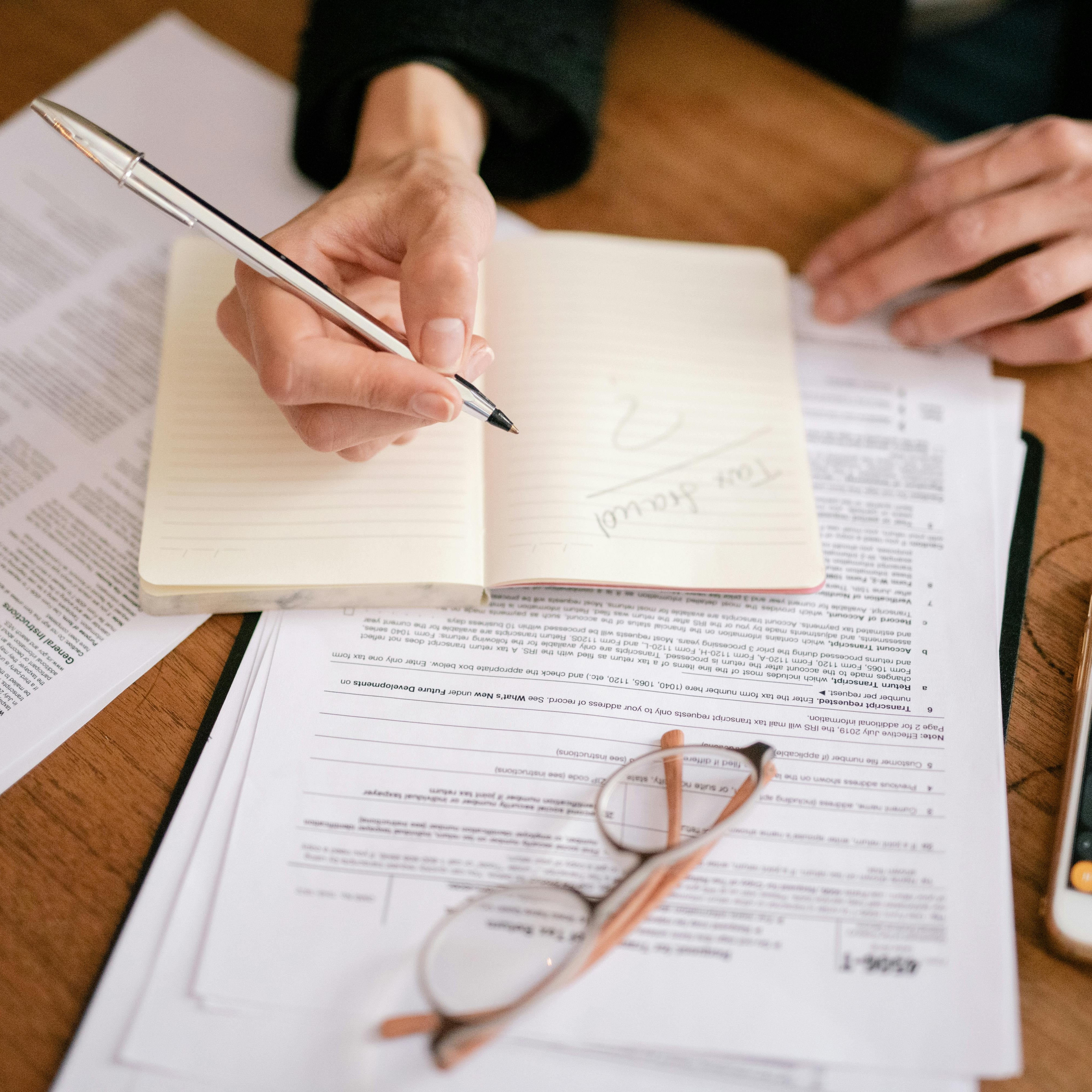 Financial charts and documents on a modern desk