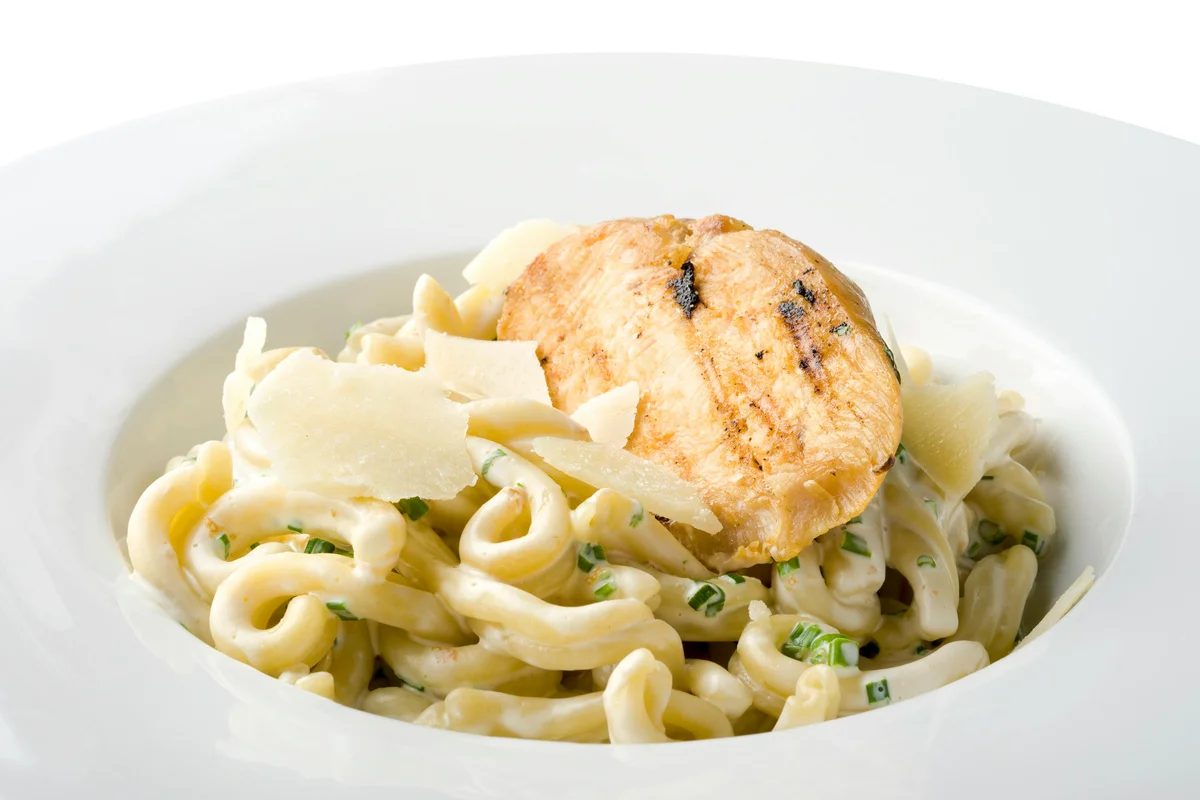 Baker shaping artisan bread dough at Sweet Crumb Bakery in Austin