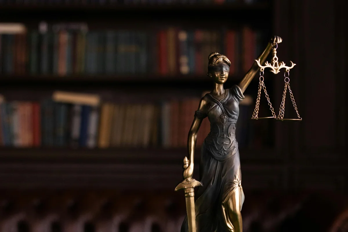 Sterling Law Group office interior with classic wood paneling and legal library