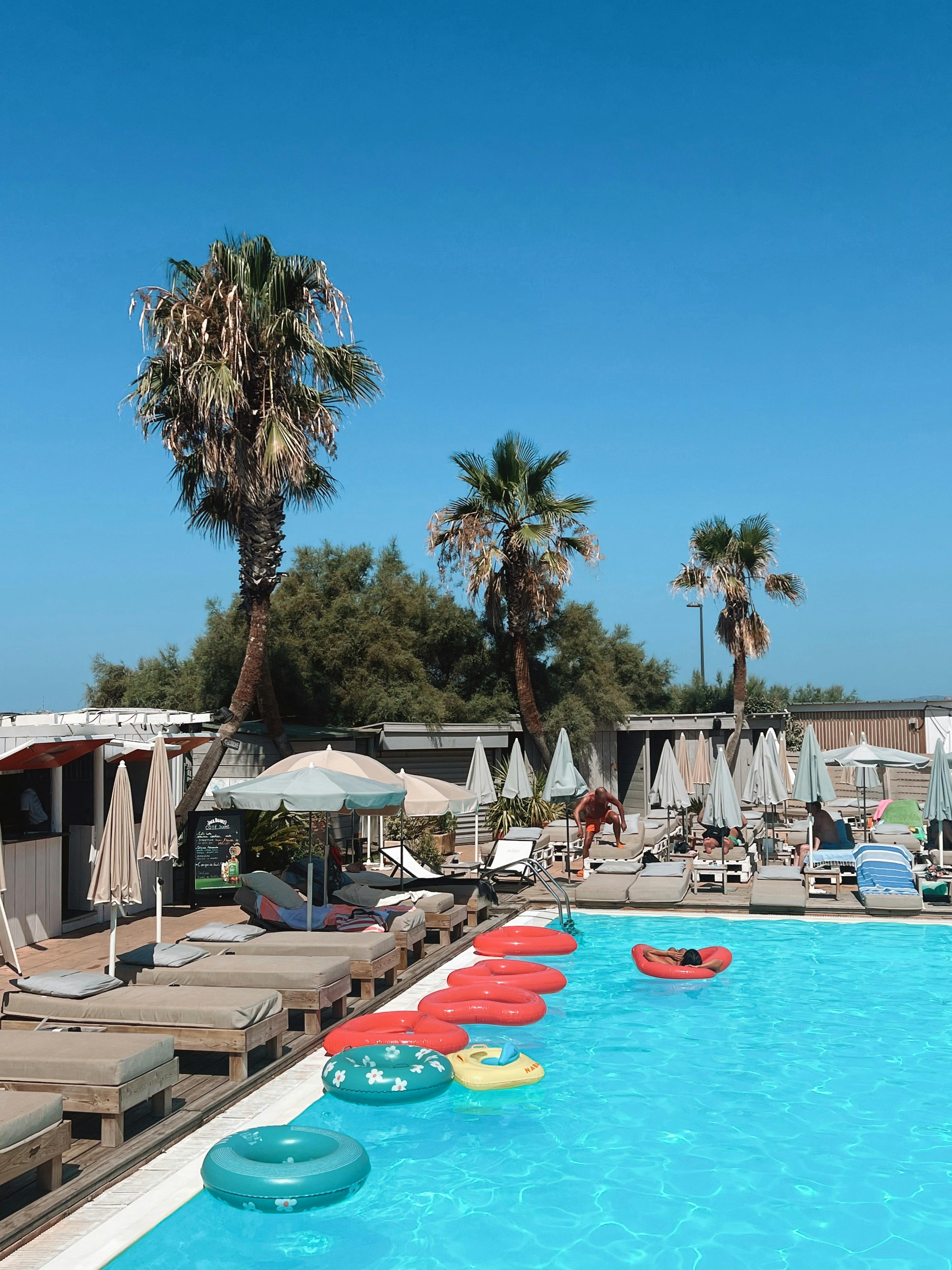 Hotel pool area with mountain backdrop