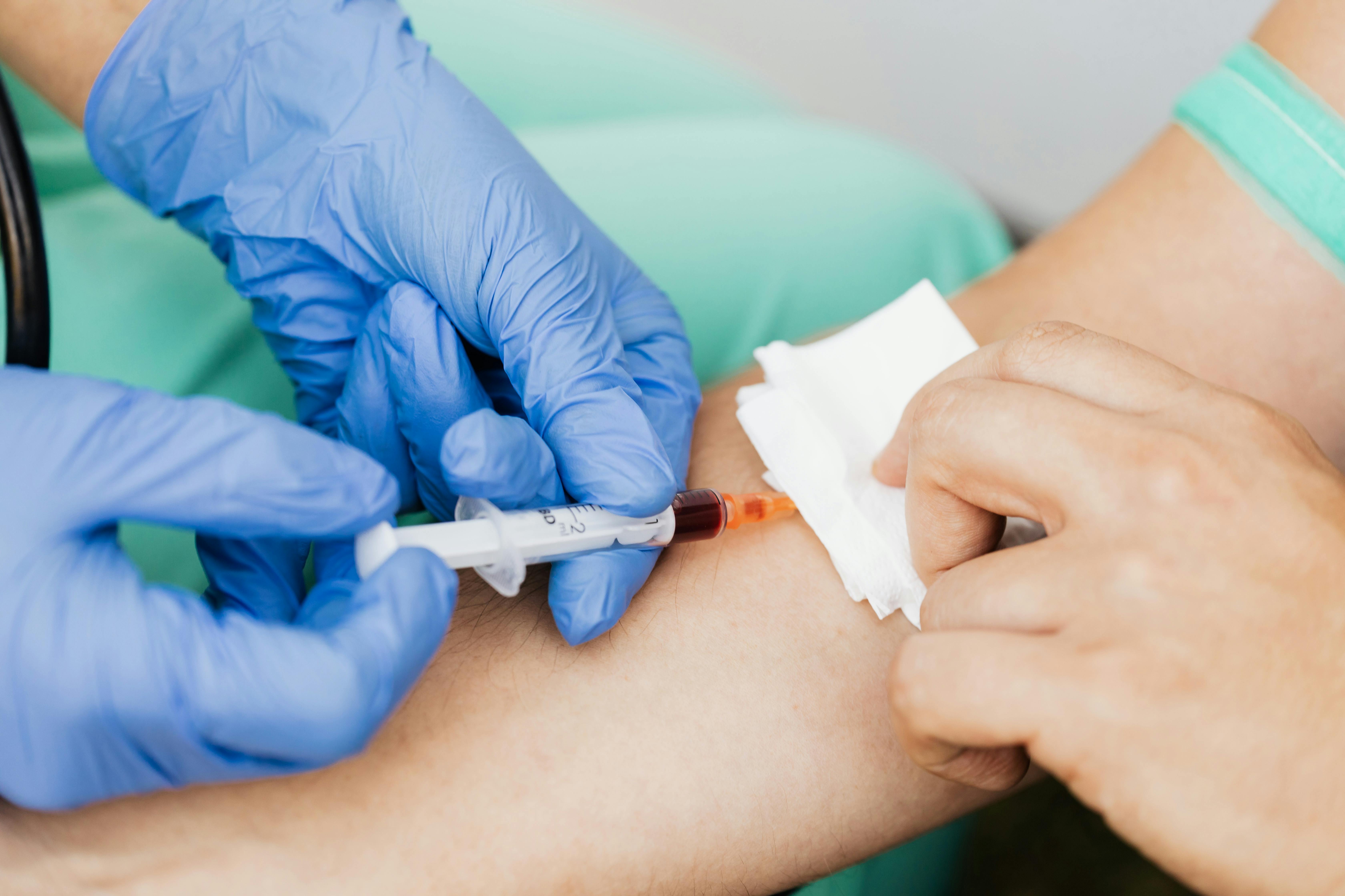 Physician in conversation with a patient, warm clinical setting