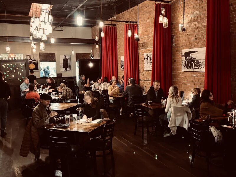 Guests enjoying dinner in our warm cantina atmosphere