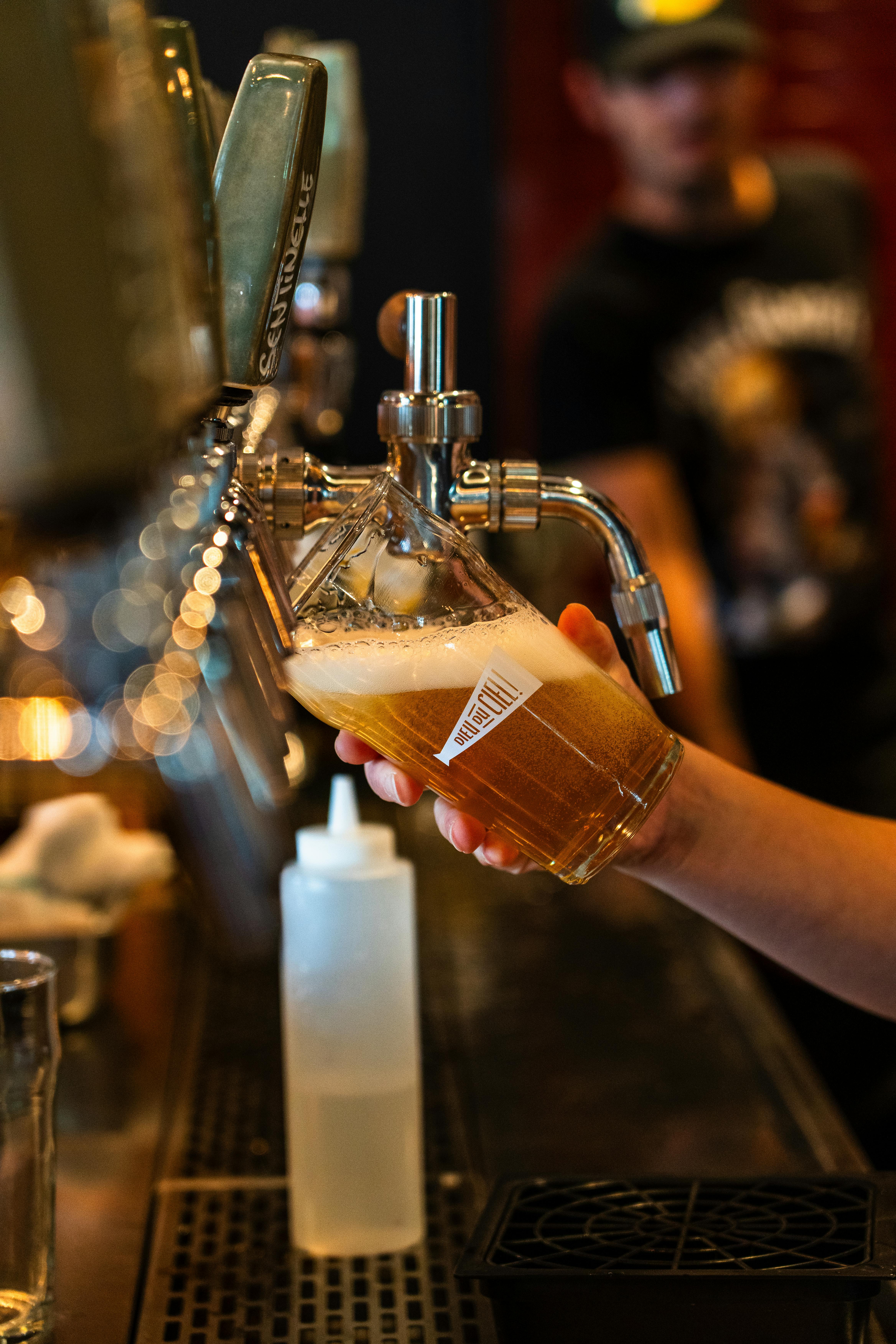 Fresh craft beer being poured into a glass